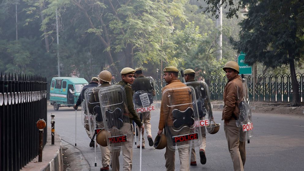 Violence at work India prime minister addresses rally as protest deaths climb