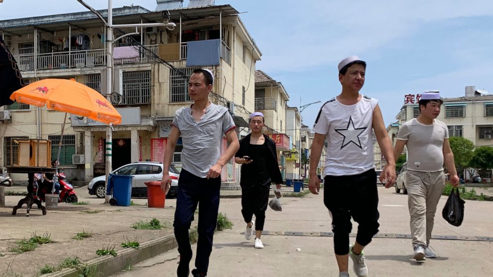 Violence at work China’s Uighurs trapped in factory toiling for tech titans